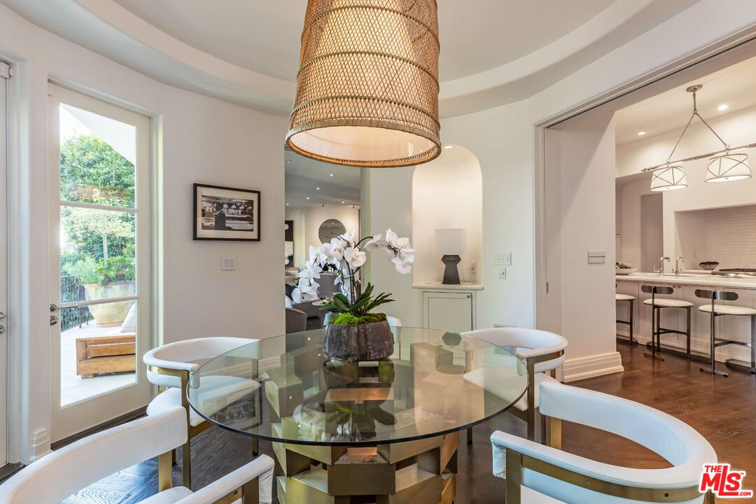 8 Oakmont Drive Los Angeles, CA 90049 - Photo 16 of 46 a dining room with furniture and window