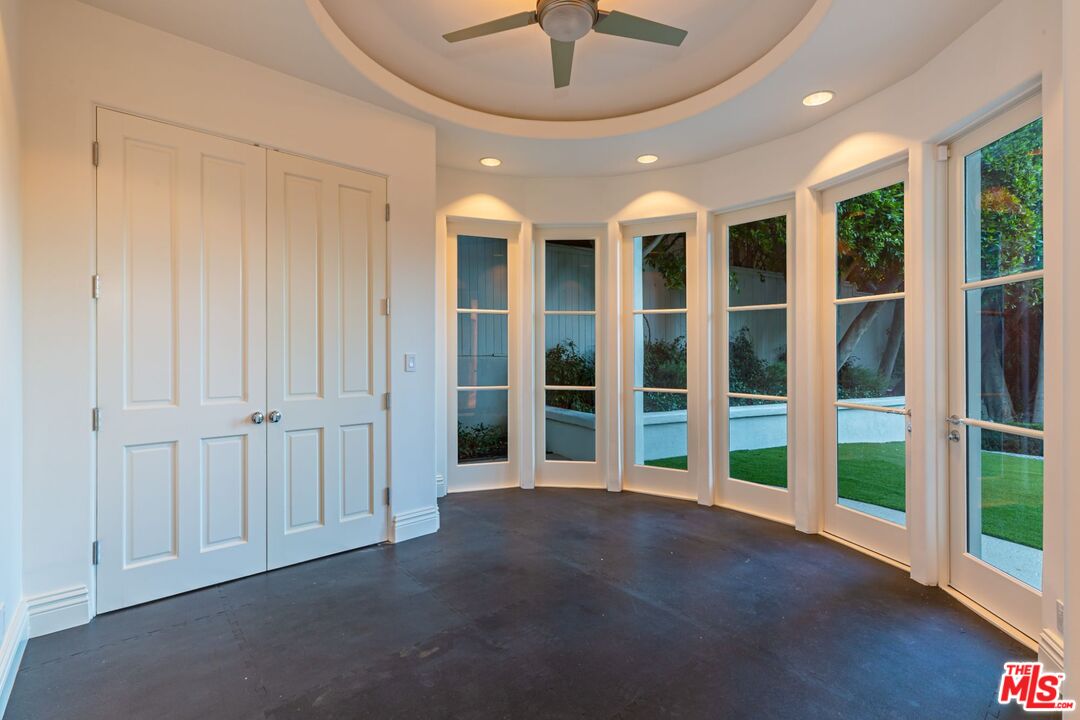 8 Oakmont Drive Los Angeles, CA 90049 - Photo 32 of 46 a view of an empty room with windows