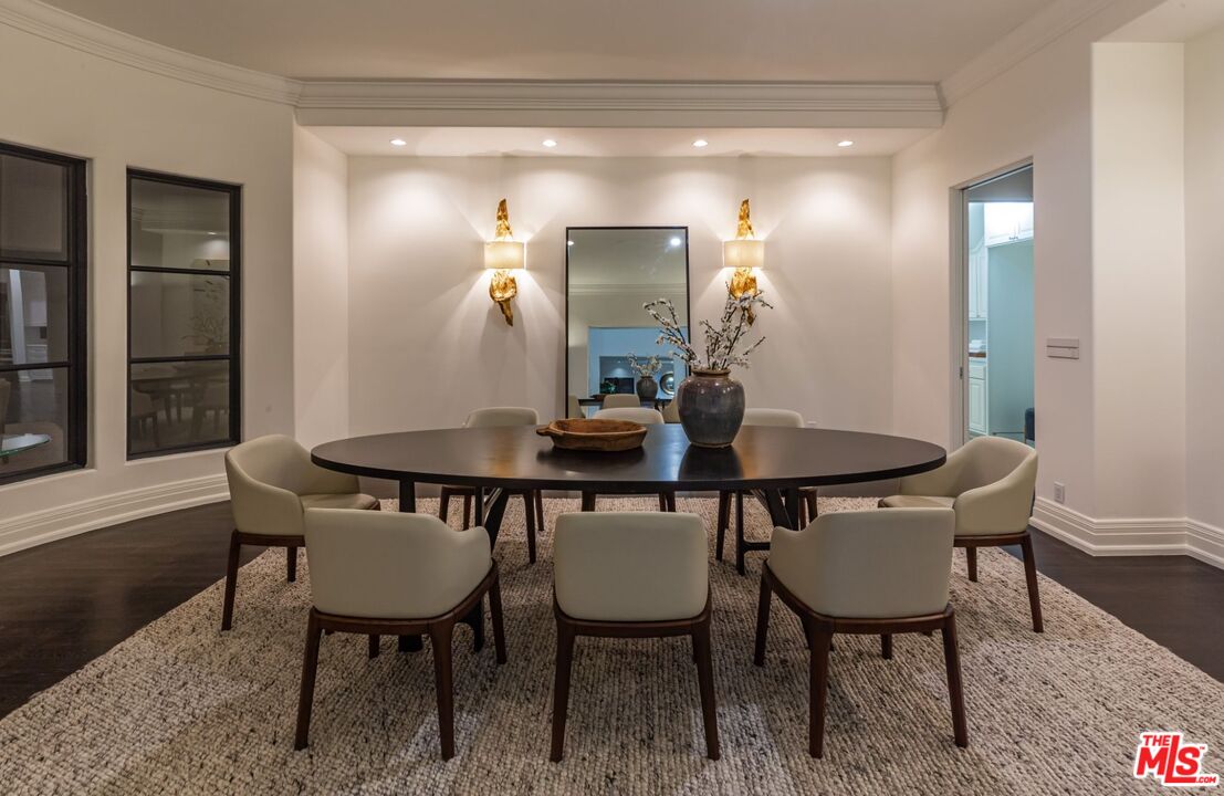 8 Oakmont Drive Los Angeles, CA 90049 - Photo 38 of 46 a view of a dining room with furniture