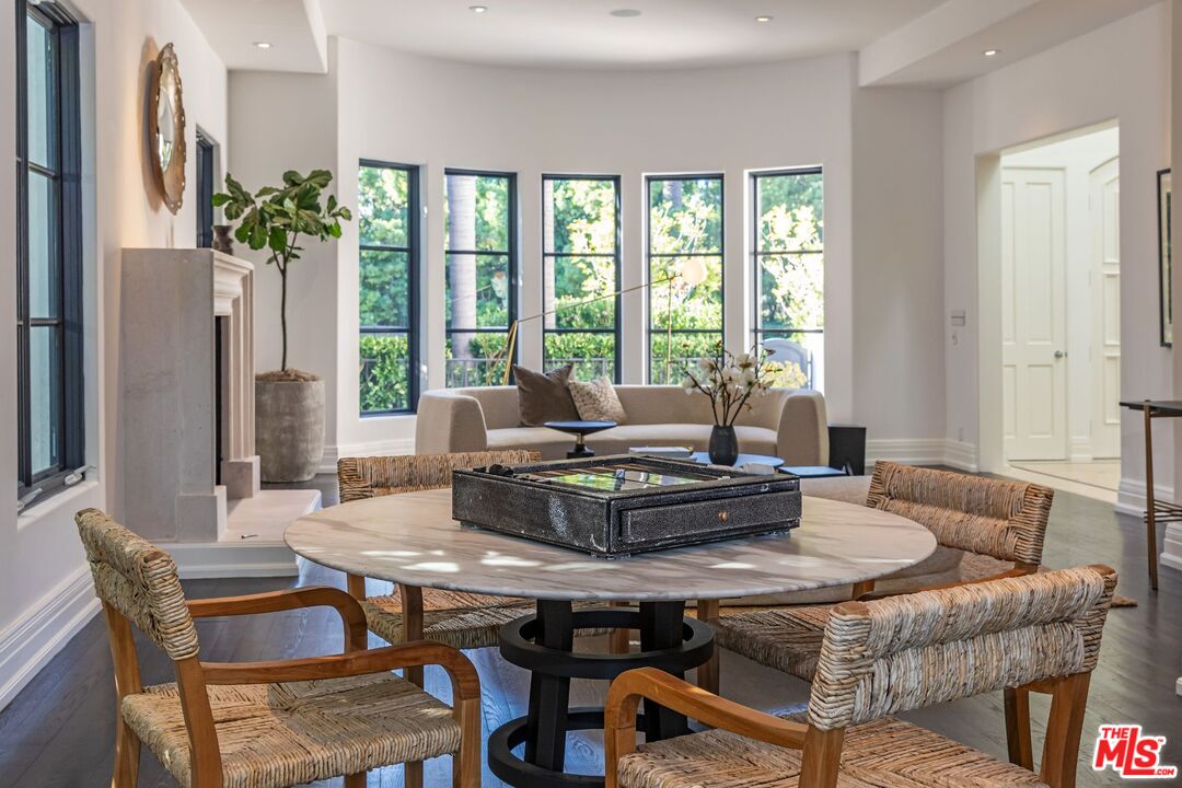 8 Oakmont Drive Los Angeles, CA 90049 - Photo 8 of 46 a living room with furniture and a potted plant