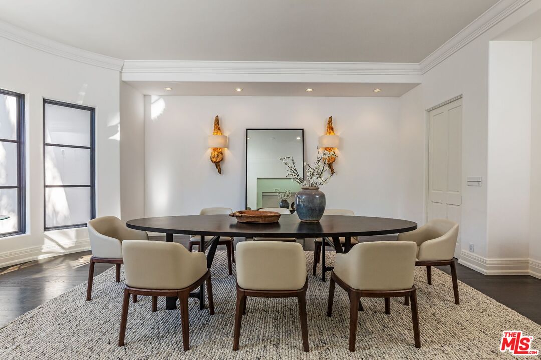 8 Oakmont Drive Los Angeles, CA 90049 - Photo 9 of 46 a view of a dining room with furniture and wooden floor