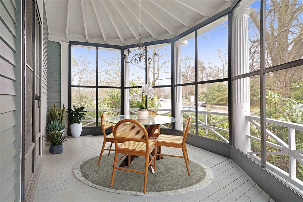 285 Clinton Road Brookline, MA 02245 - Photo 12 of 28 a dining room with furniture water view and balcony