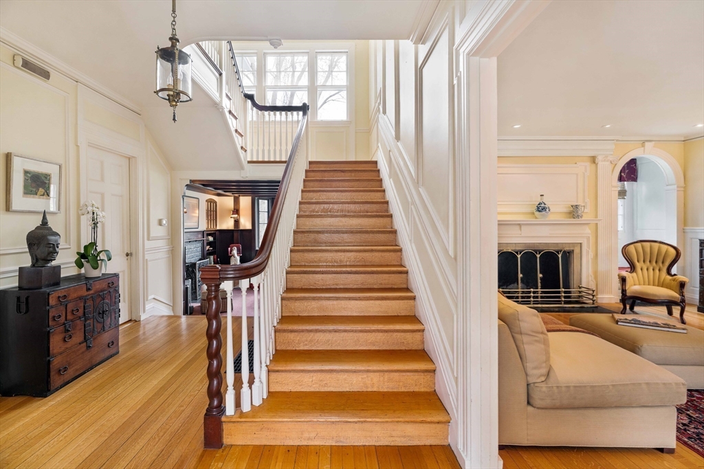 285 Clinton Road Brookline, MA 02245 - Photo 6 of 28 a view of entryway and hall with wooden floor
