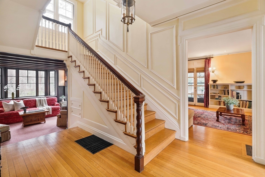 285 Clinton Road Brookline, MA 02245 - Photo 7 of 28 a view of an entryway with wooden floor and windows