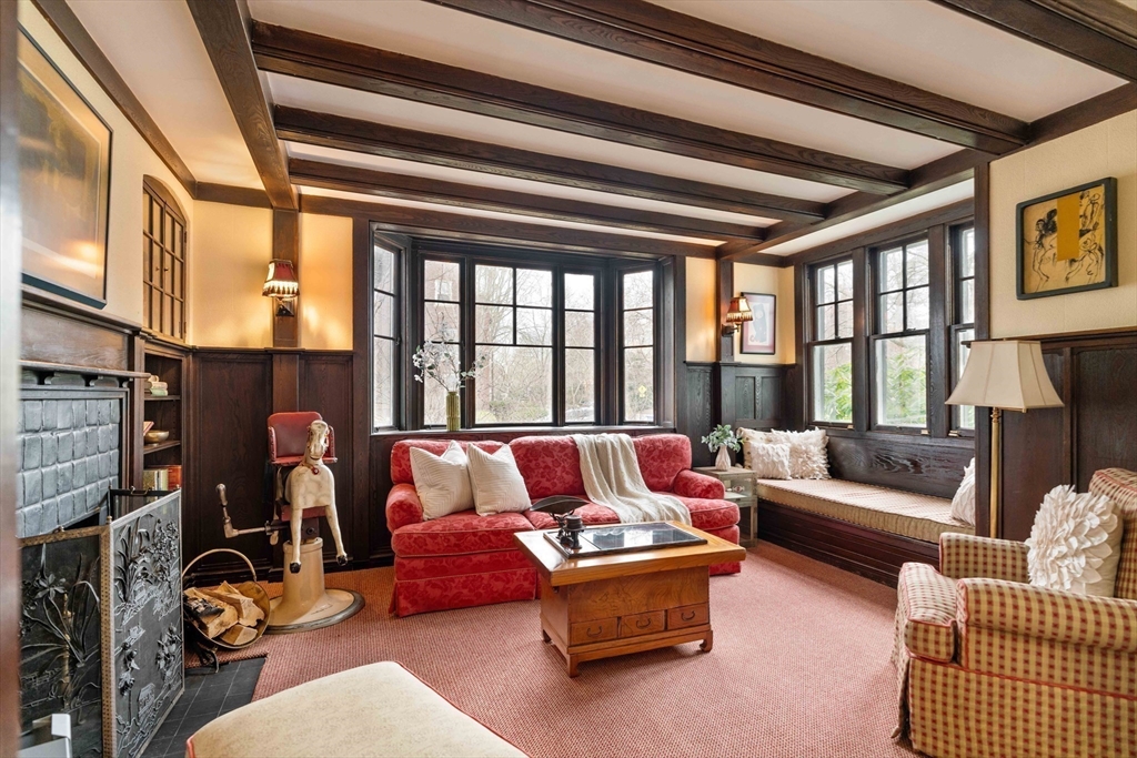 285 Clinton Road Brookline, MA 02245 - Photo 9 of 28 a living room with furniture and a floor to ceiling window