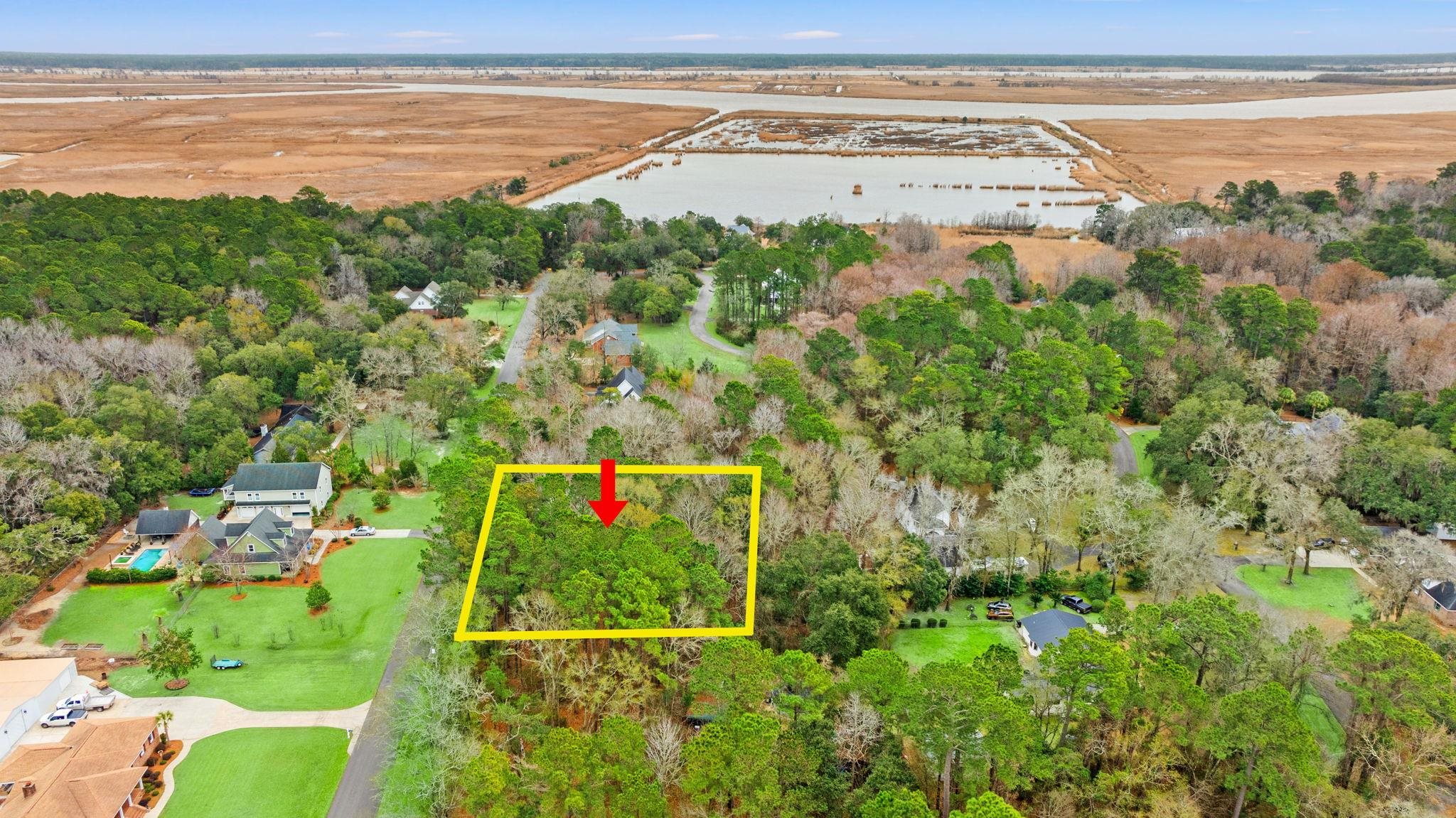 Lot 3 3rd Avenue Georgetown, SC 29440 - Photo 5 of 6 Aerial view of property and surrounding area with a large body of water and property parcel outlined