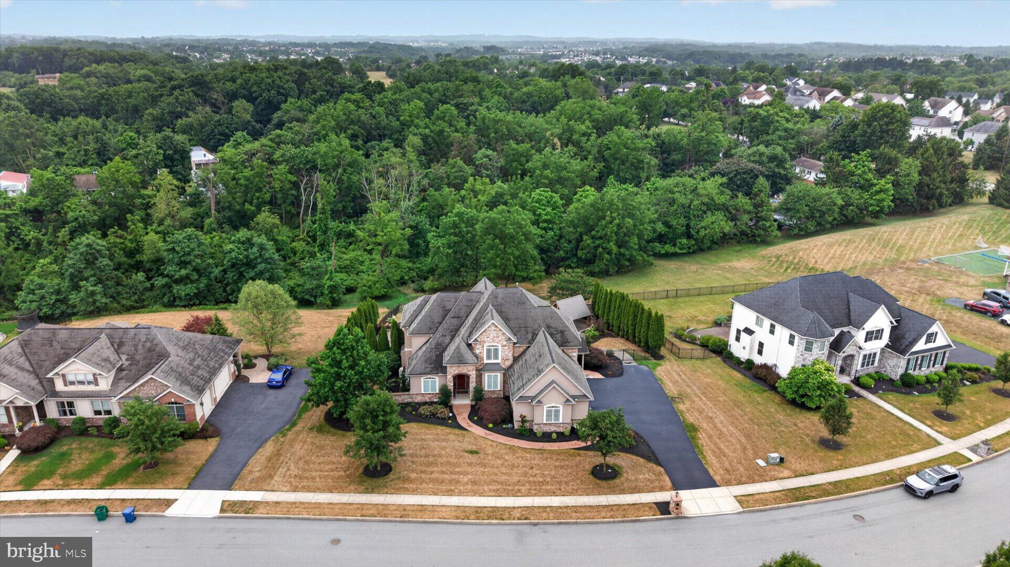 6505 Plowman Ridge Harrisburg, PA 17112 - Photo 76 of 83 Elegant homes nestled in lush greenery.