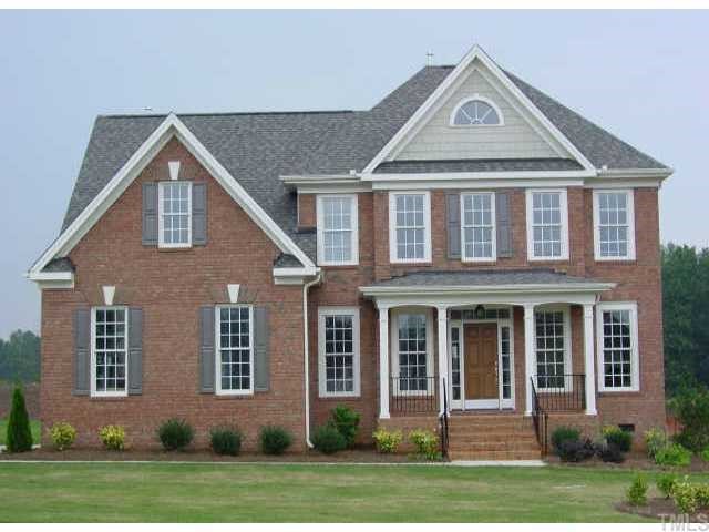 4516 Deer Stream Lane Raleigh, NC 27603 - Photo 1 of 1 a front view of a house with a yard