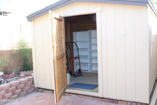 a view of front door and bedroom