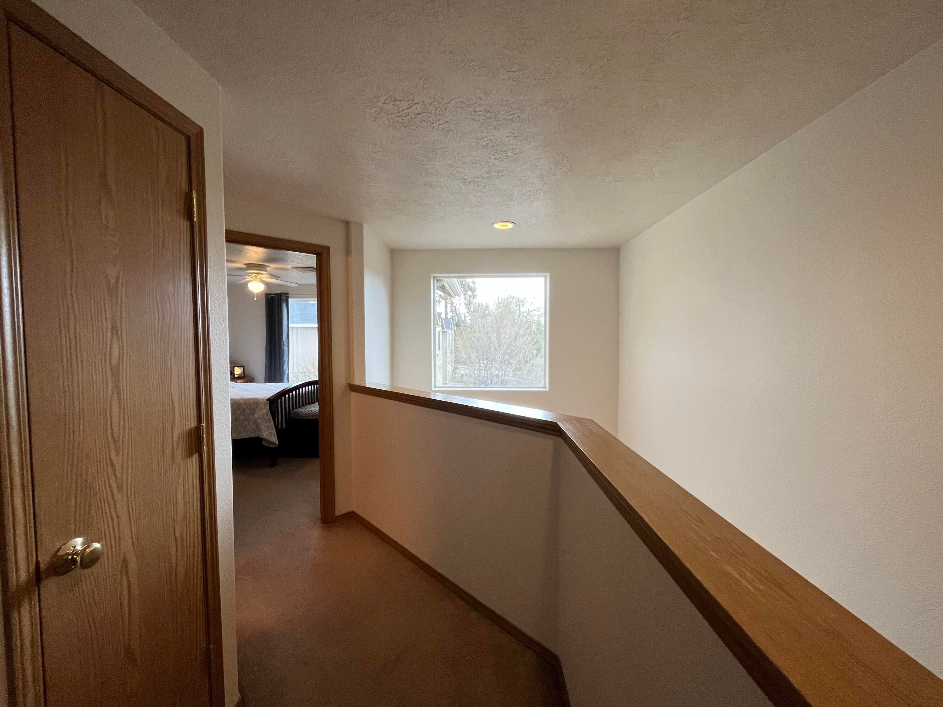1440 Southwest 16th Street Redmond, OR 97756 - Photo 24 of 30 Loft style upper hallway.