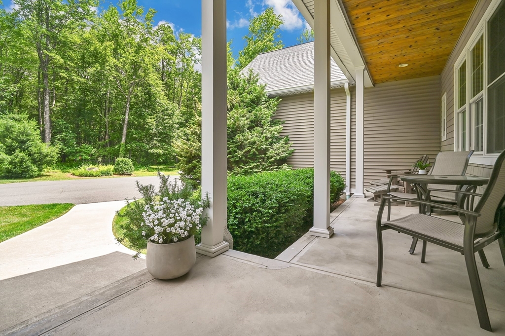 176 Silver Street Granville, MA 01034 - Photo 12 of 40 a view of a garden with patio