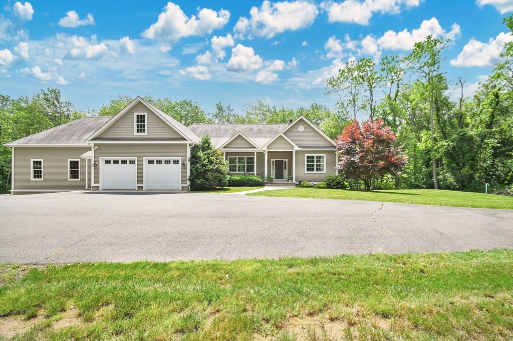 176 Silver Street Granville, MA 01034 - Photo 2 of 40 a front view of house with yard and green space