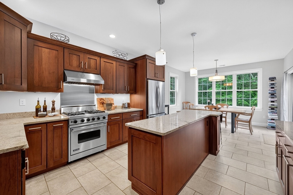 176 Silver Street Granville, MA 01034 - Photo 21 of 40 a kitchen with stainless steel appliances granite countertop a stove a sink a oven and a refrigerator