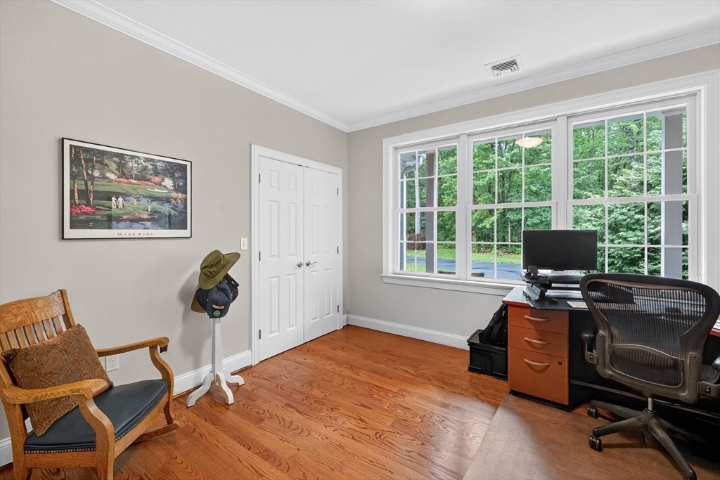 176 Silver Street Granville, MA 01034 - Photo 27 of 40 a view of a workspace with furniture and a window