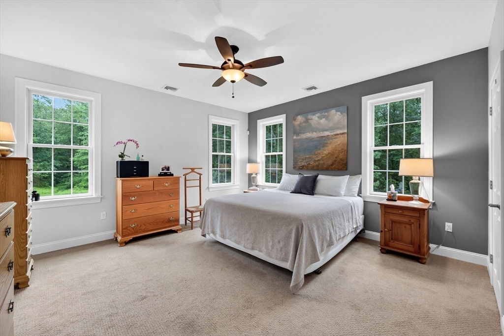 176 Silver Street Granville, MA 01034 - Photo 28 of 40 a bedroom with a bed couch and window