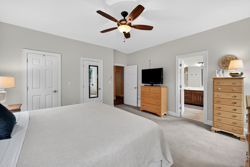 176 Silver Street Granville, MA 01034 - Photo 29 of 40 a living room with furniture and a flat screen tv