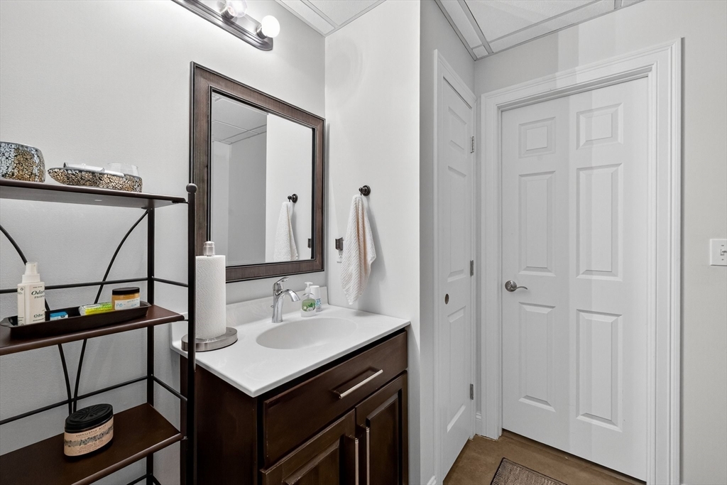 176 Silver Street Granville, MA 01034 - Photo 37 of 40 a bathroom with a sink vanity and a mirror