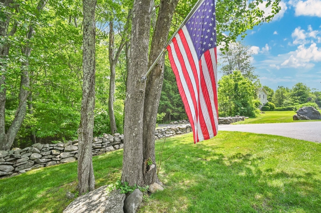 176 Silver Street Granville, MA 01034 - Photo 39 of 40 a view of a yard with a house and a park