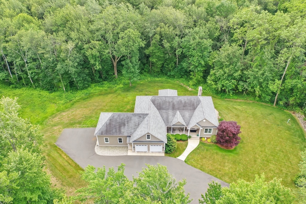 176 Silver Street Granville, MA 01034 - Photo 6 of 40 an aerial view of a house with garden space and street view