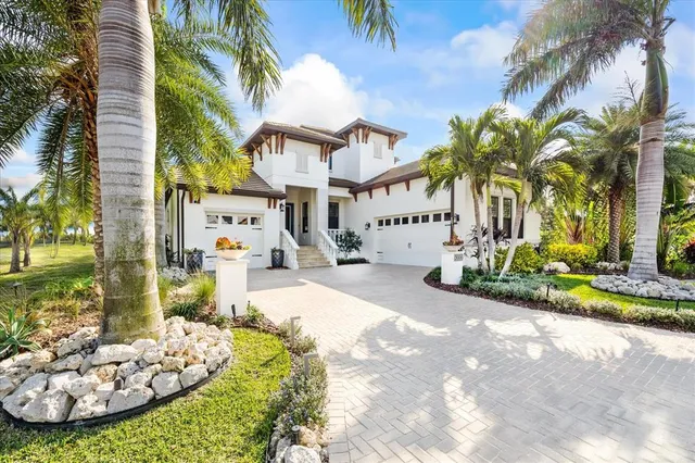 a view of a chair and tables in the patio