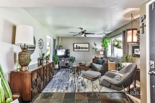 429 West Perdew Avenue Ridgecrest, CA 93555 - Photo 23 of 50 a living room with furniture and wooden floor