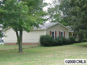 5524 West Joe Griffin Road Monroe, NC 28112 - Photo 3 of 3 a view of a house with a yard