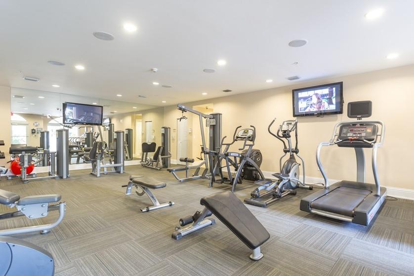 9357 Southwest 77th Avenue, Unit 25245 Miami, FL 33156 - Photo 13 of 20 a view of a room with gym equipment