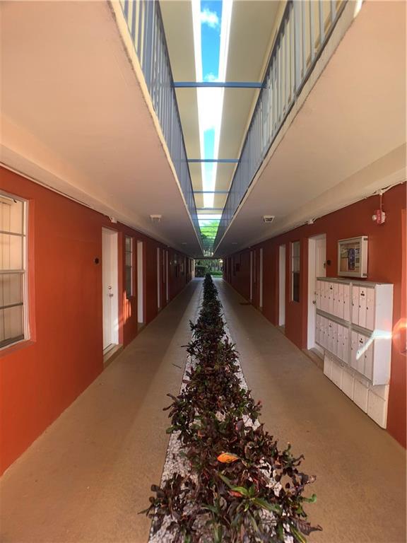 9357 Southwest 77th Avenue, Unit 25245 Miami, FL 33156 - Photo 9 of 20 a view of entryway