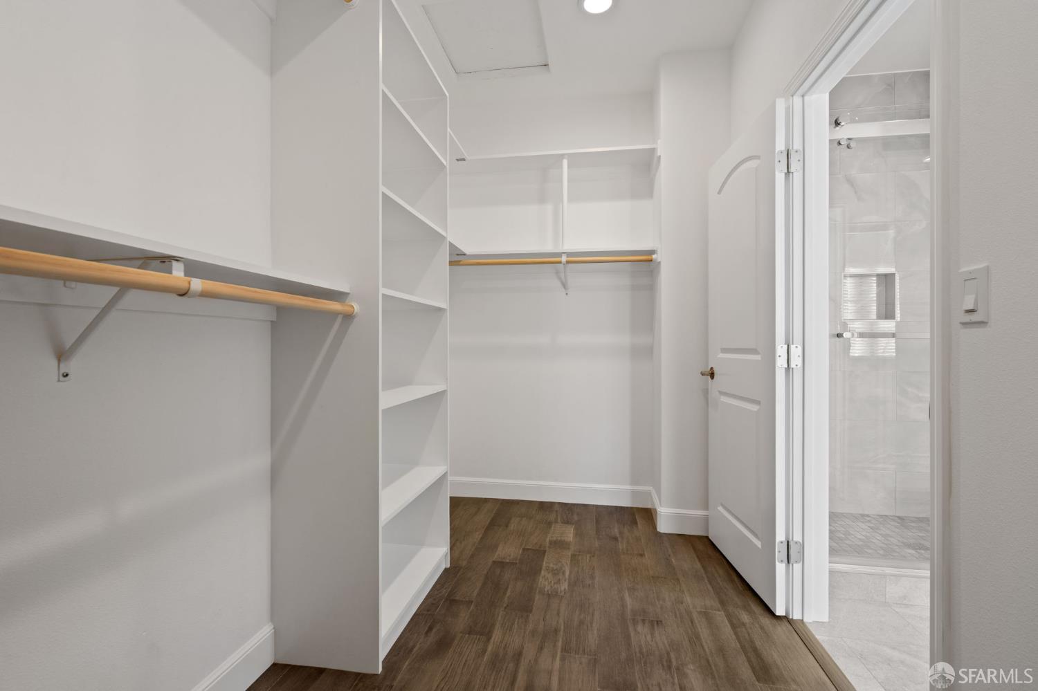 42119 Vinha Way Fremont, CA 94539 - Photo 30 of 43 a view of walk in closet with empty racks