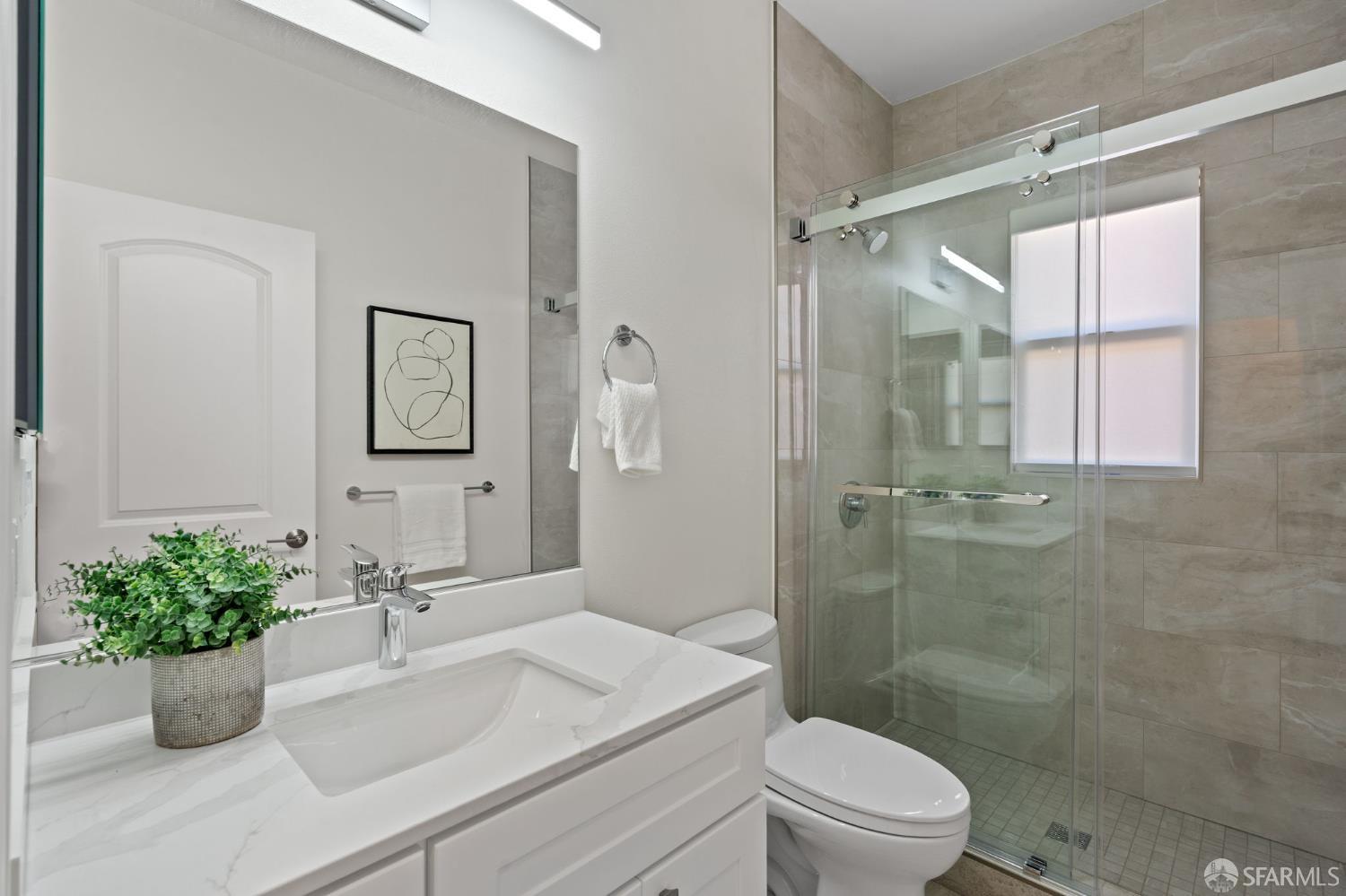 42119 Vinha Way Fremont, CA 94539 - Photo 32 of 43 a bathroom with a sink a toilet and shower