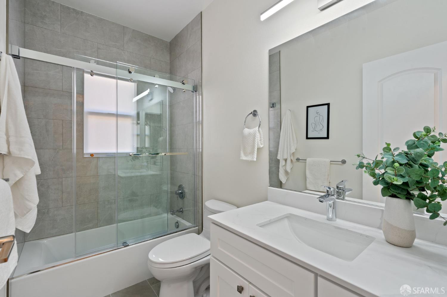 42119 Vinha Way Fremont, CA 94539 - Photo 35 of 43 a bathroom with a sink a toilet and shower