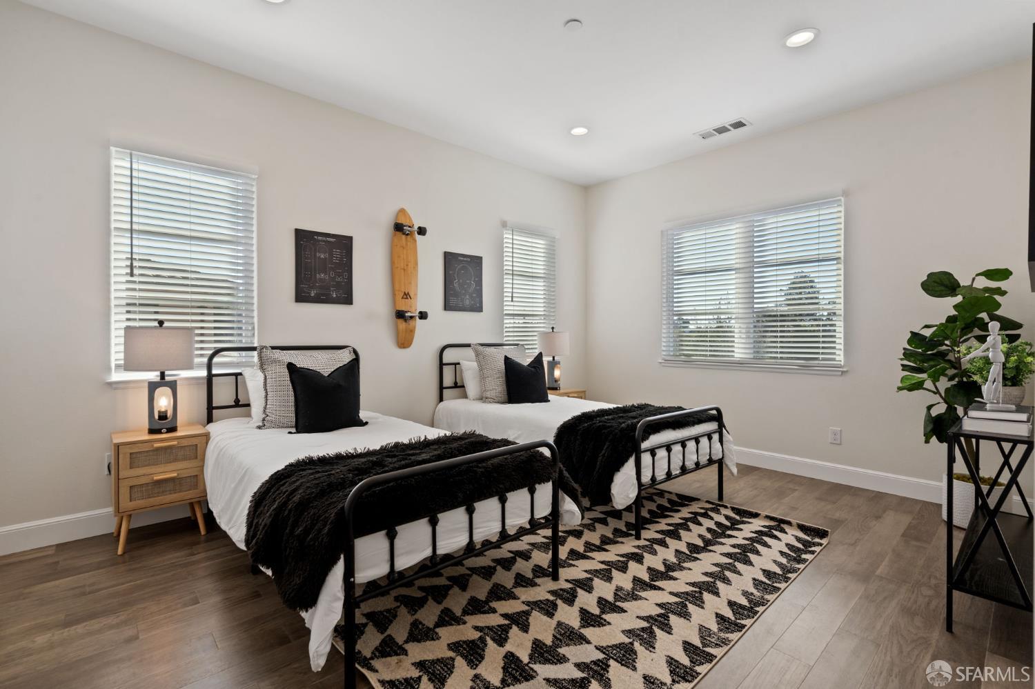 42119 Vinha Way Fremont, CA 94539 - Photo 36 of 43 a bedroom with a bed and wooden floor