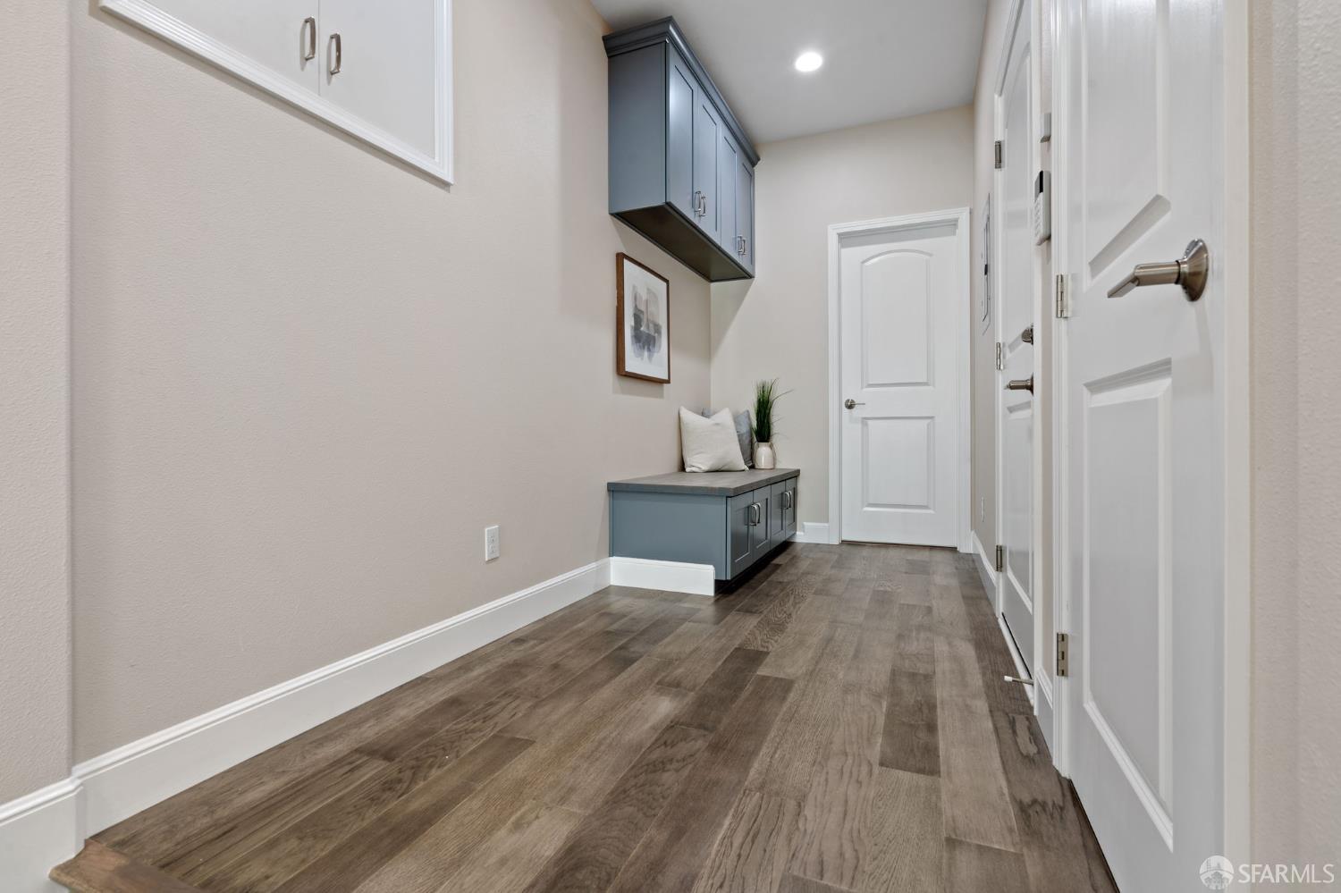 42119 Vinha Way Fremont, CA 94539 - Photo 38 of 43 a view of a livingroom with wooden floor and stairs