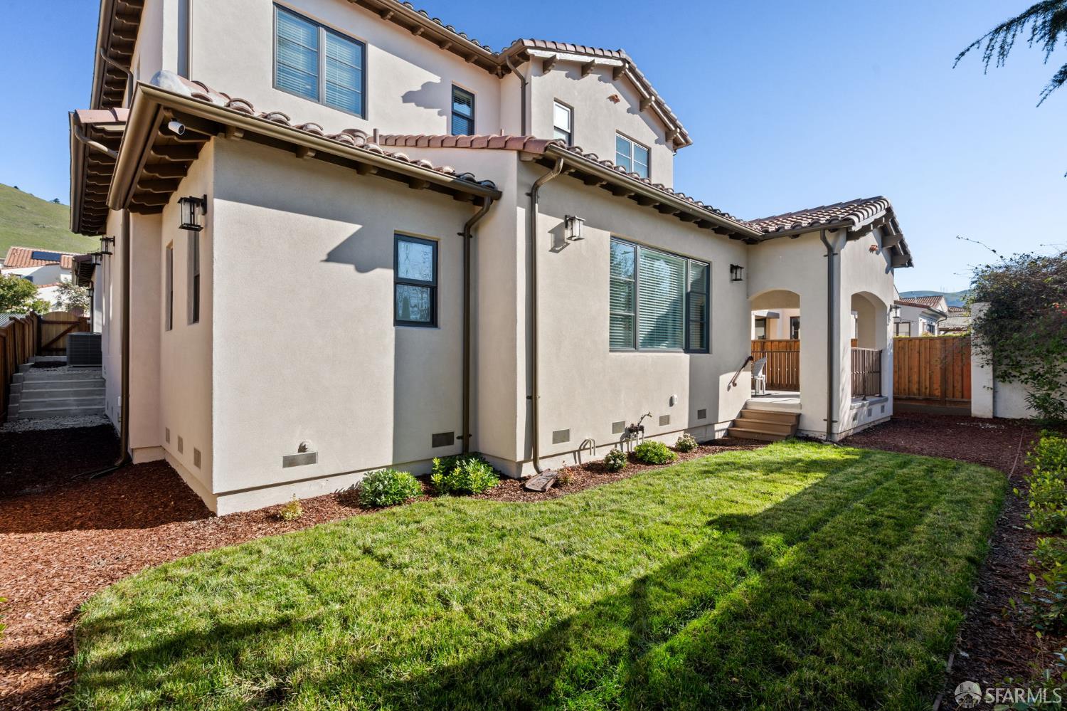 42119 Vinha Way Fremont, CA 94539 - Photo 41 of 43 a front view of a house with garden