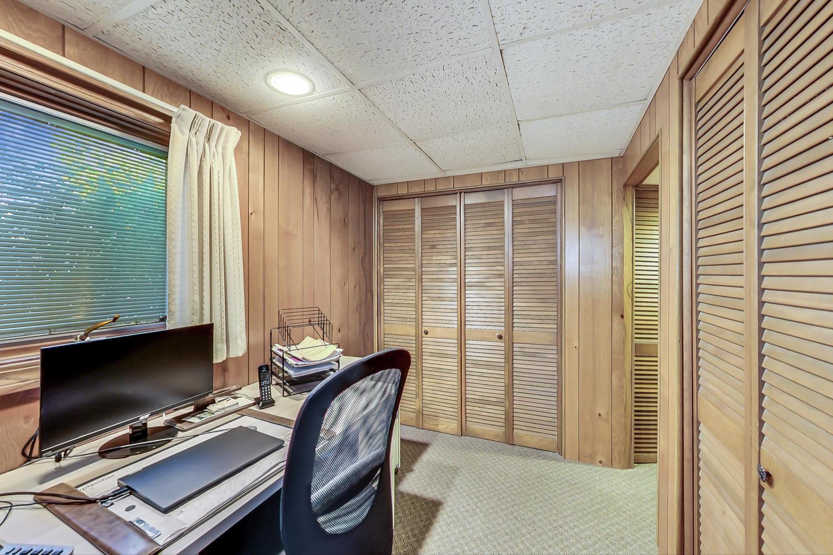 1715 Fremont Road Hoffman Estates, IL 60169 - Photo 35 of 59 a view of a workspace with furniture and a window