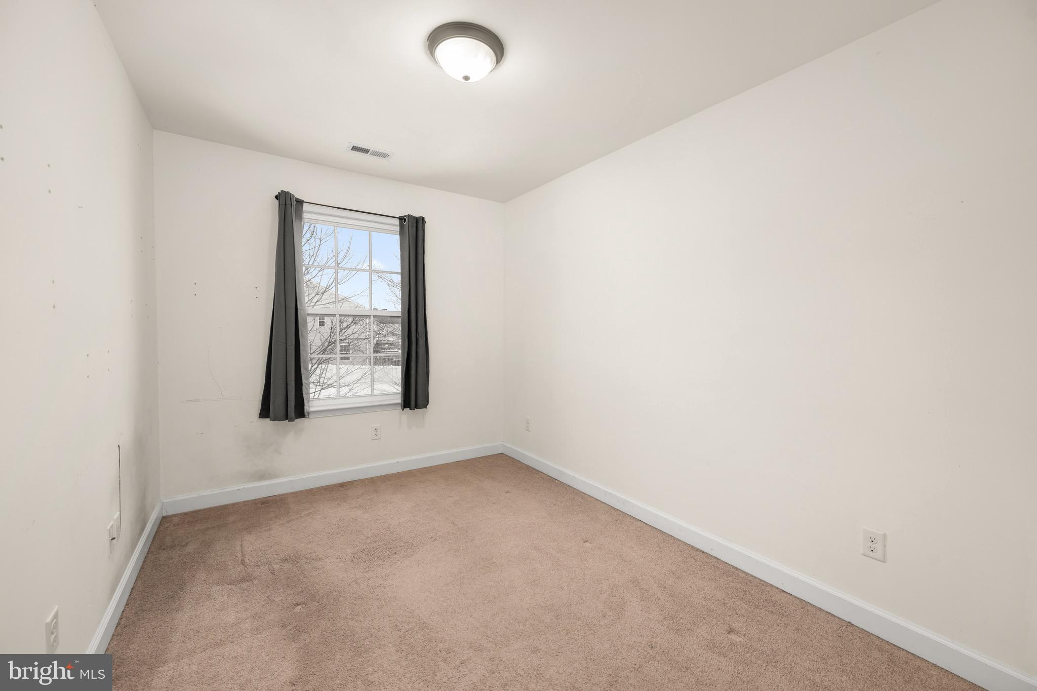 143 Medal Way Magnolia, DE 19962 - Photo 21 of 34 an empty room with windows