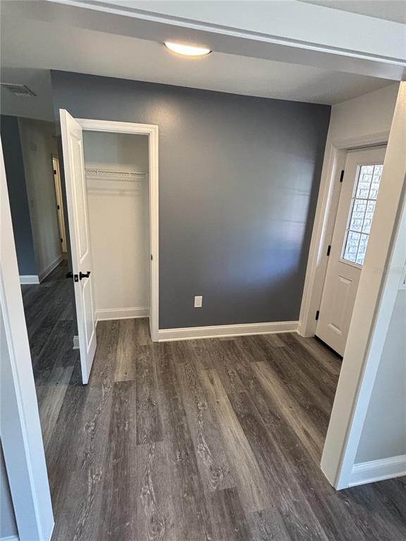 2911 Williams Road Plant City, FL 33565 - Photo 24 of 51 a view of empty room with wooden floor