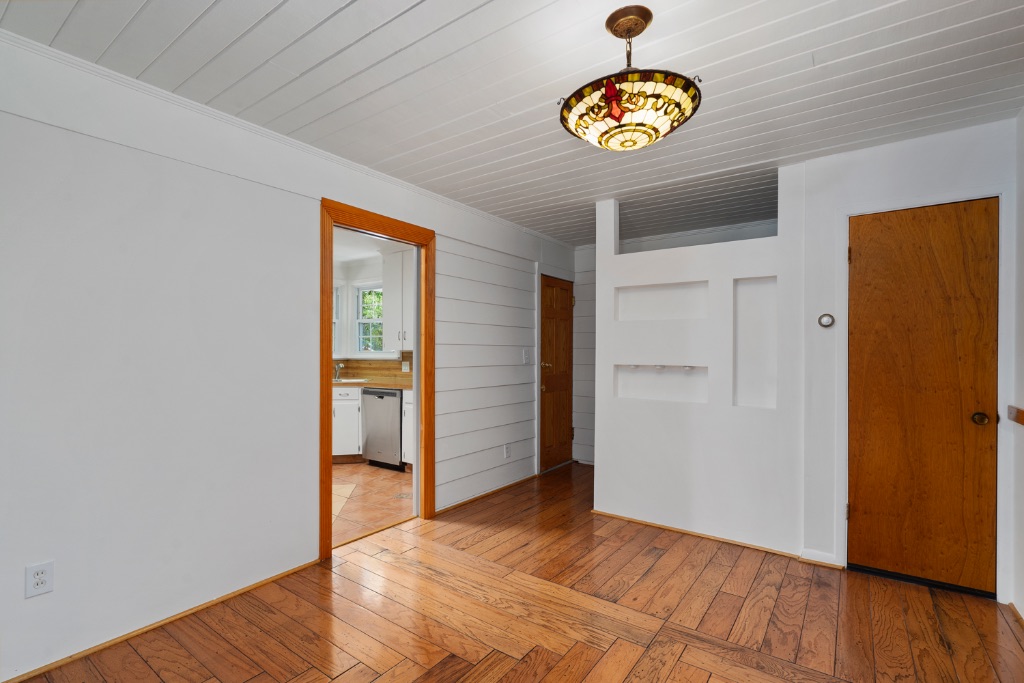 1212 Bentwood Road Austin, TX 78722 - Photo 14 of 32 a view of an entryway with wooden floor