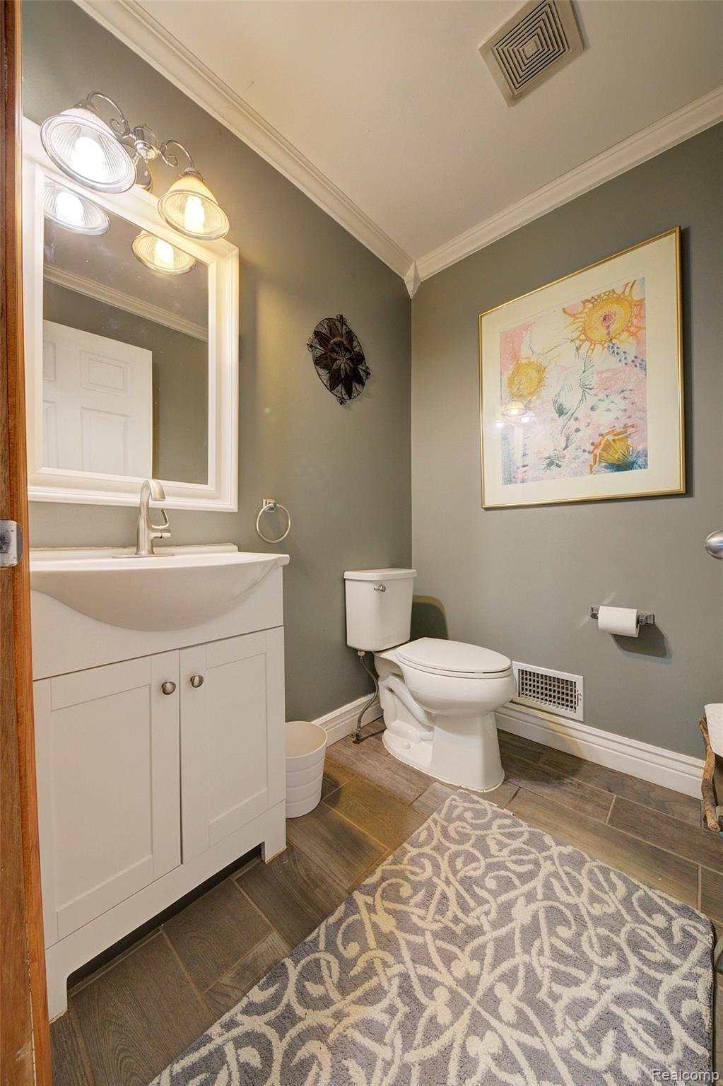 9103 Pierson Road Fowlerville, MI 48836 - Photo 16 of 35 half bath.jpg