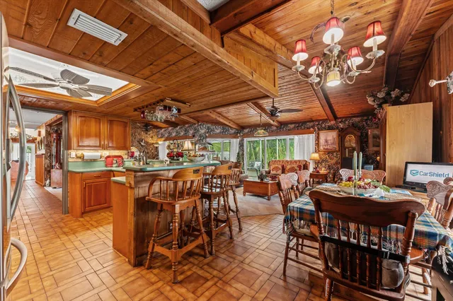 a bathroom with a double vanity sink mirror and shower