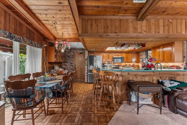 a view of a workspace with furniture