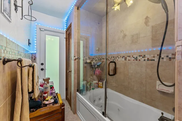 an aerial view of a house with a swimming pool