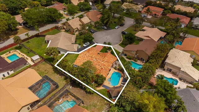 a view of a swimming pool with a patio
