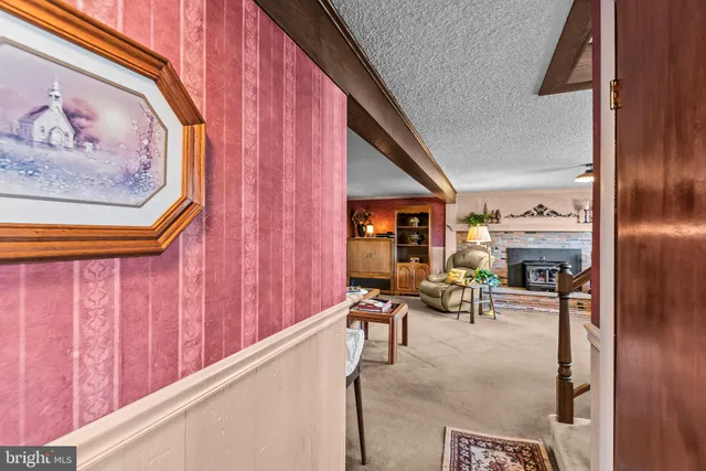 a kitchen with stainless steel appliances granite countertop a refrigerator sink and cabinets