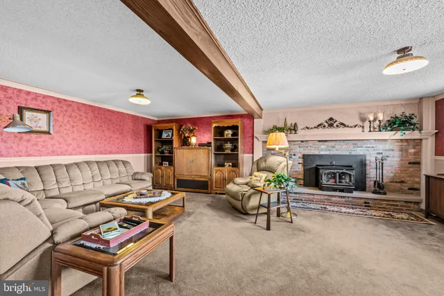 a kitchen with stainless steel appliances a refrigerator sink and cabinets