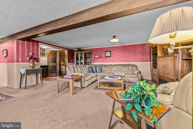 a kitchen with a sink and a large window