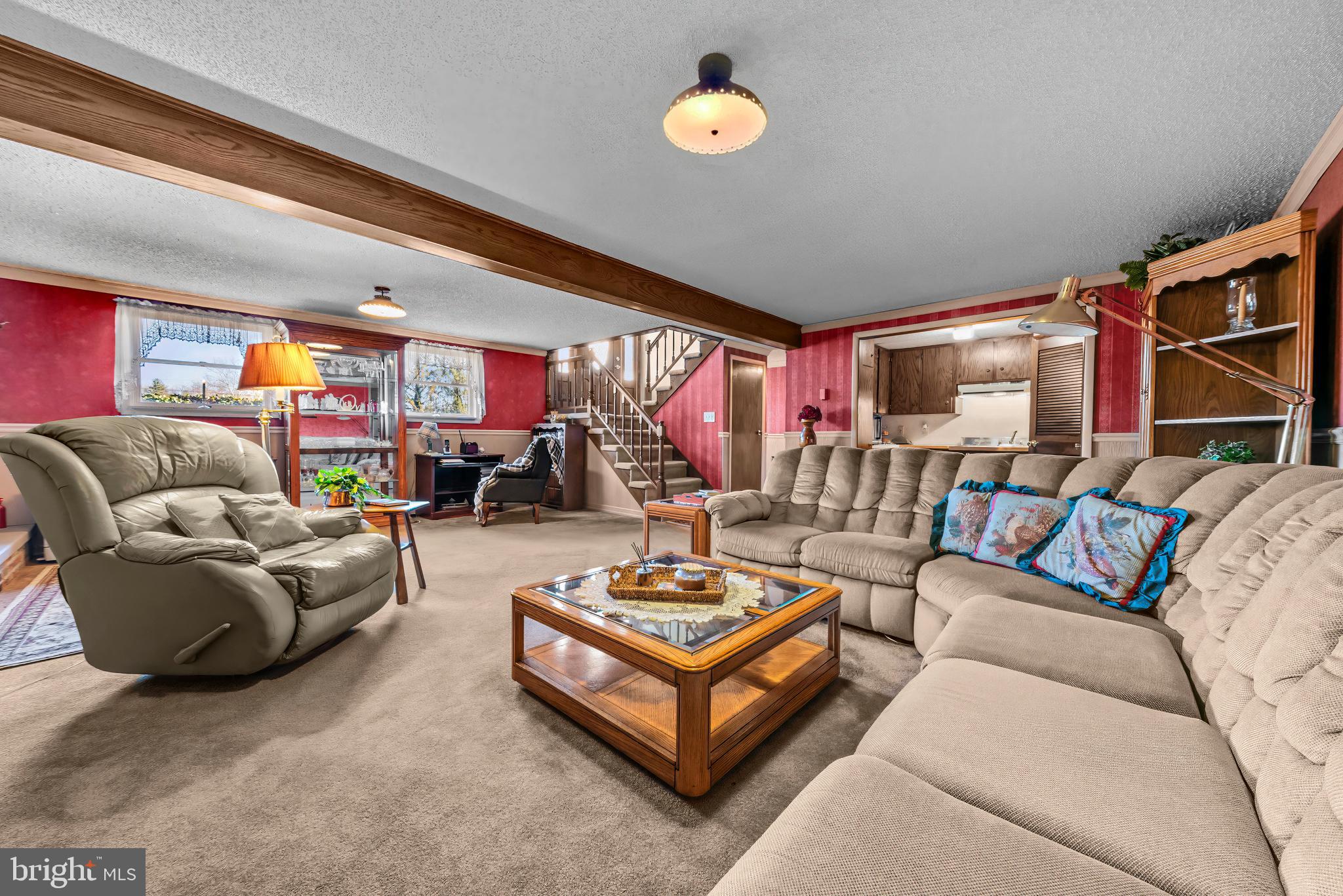 125 Housel Road Hopewell, PA 16650 - Photo 17 of 105 a living room with furniture a rug and a window