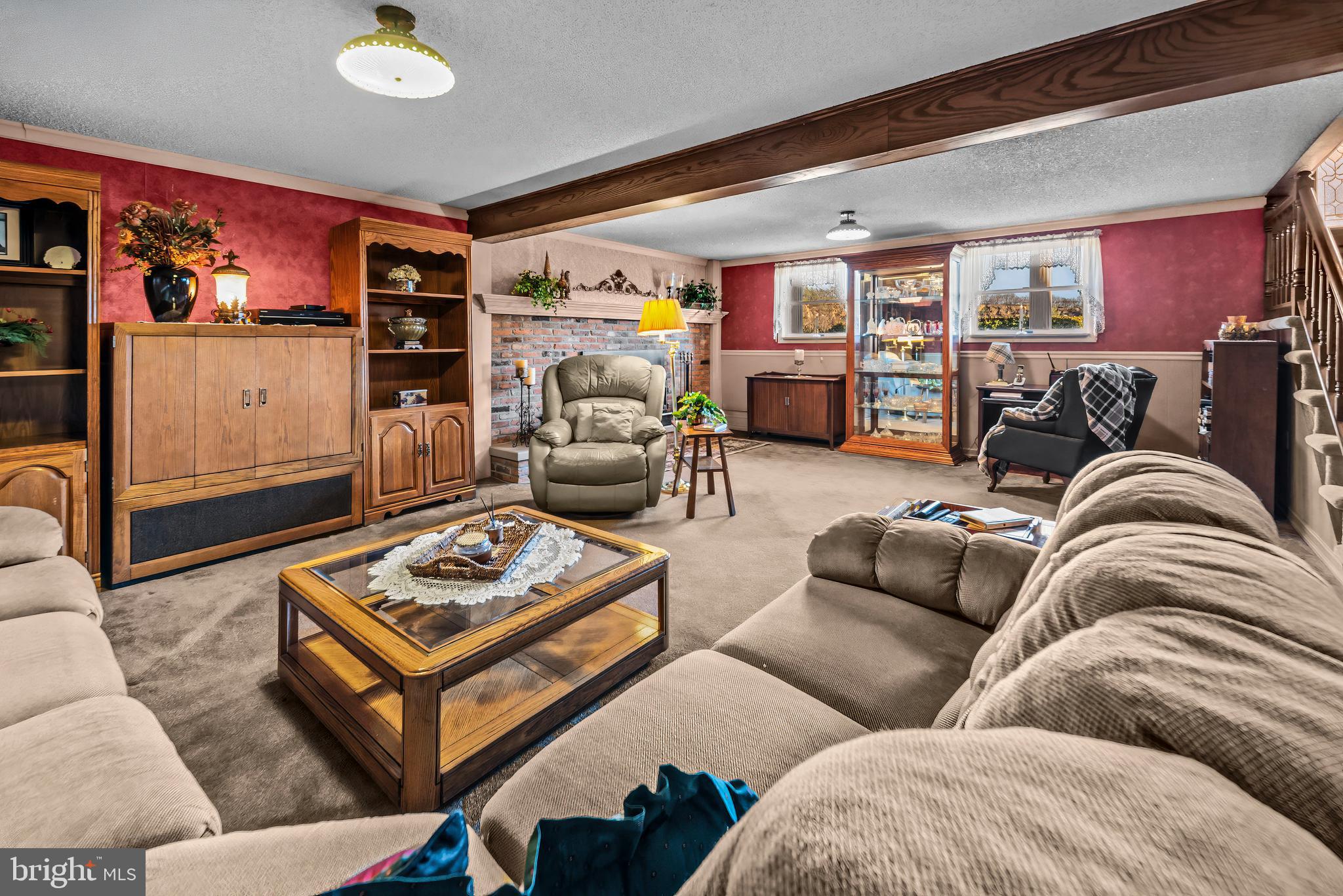 125 Housel Road Hopewell, PA 16650 - Photo 19 of 105 a living room with furniture a rug and a window