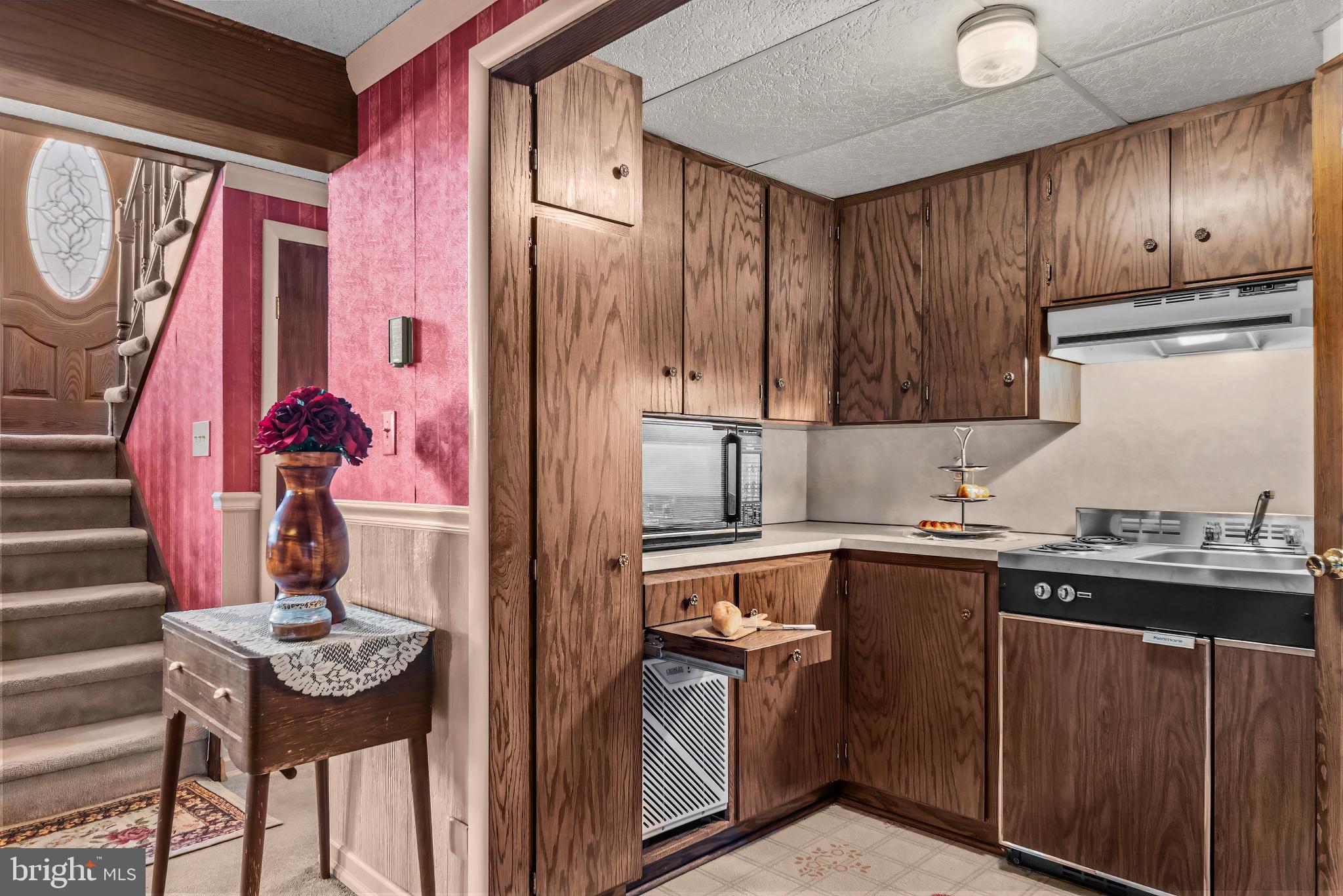125 Housel Road Hopewell, PA 16650 - Photo 20 of 105 a kitchen with stainless steel appliances granite countertop a sink and cabinets