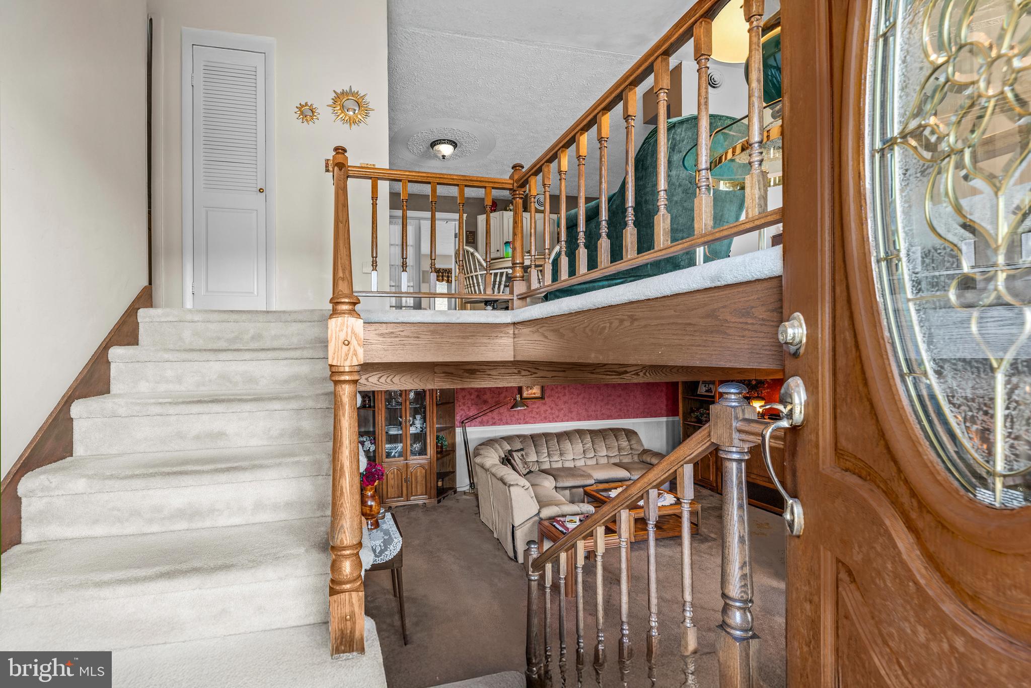 125 Housel Road Hopewell, PA 16650 - Photo 28 of 105 a view of entryway and hall with wooden floor